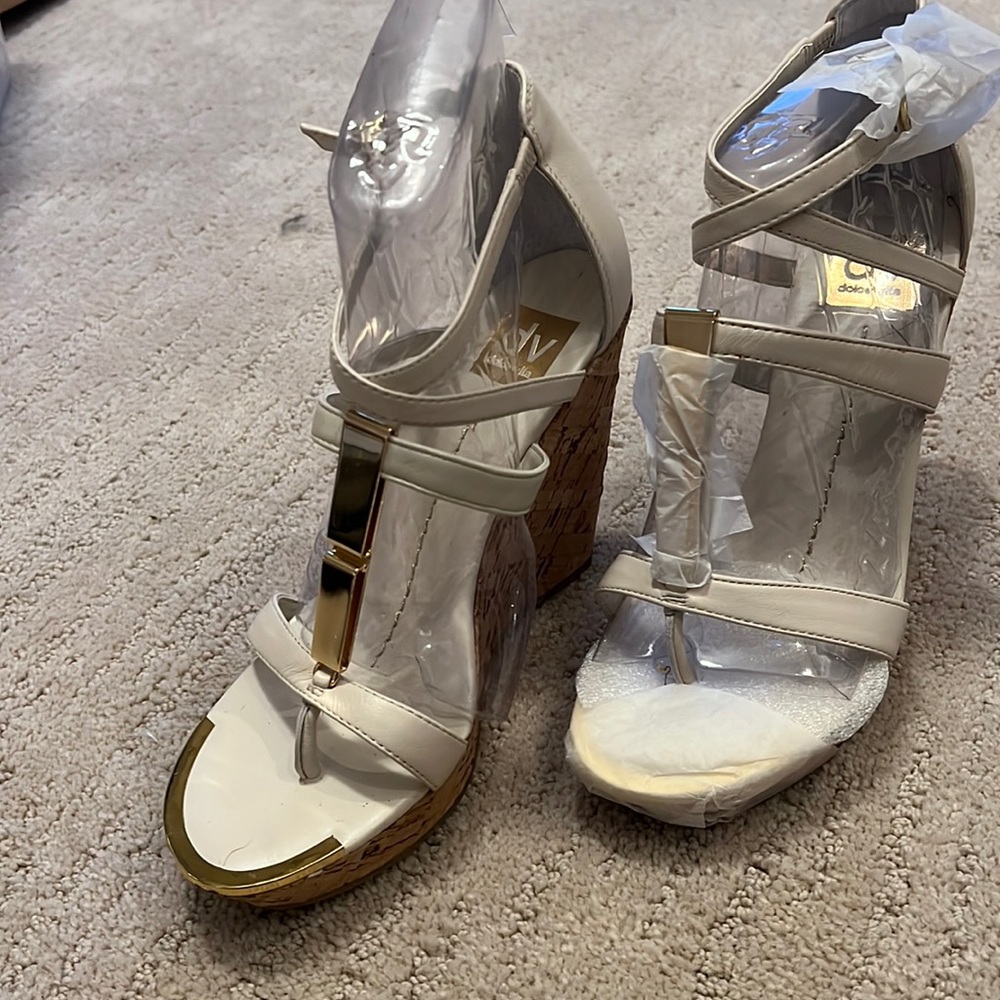 Dolce Vita off white wedges with gold accent.